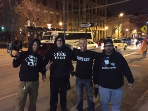 Ademo, Deo and Larry (all in CopBlock Gear) with Cleveland man wearing "Cops Lie" shirt. 