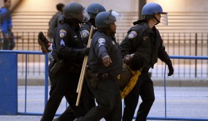 Baltimore police arrest man after march to City Hall