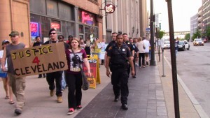 protesters escorted