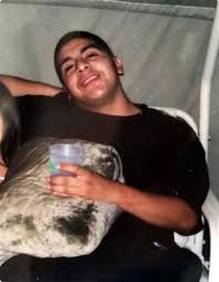 Andrew Arevalo was also shot and seriously injured by a guard's shotgun, but survived.