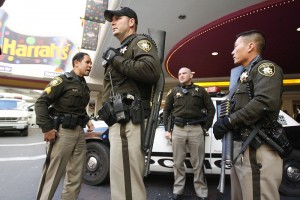 Las Vegas police stand guard outside the Harrah's hotel-casino in Las Vegas on Feb. 21, 2006. As officer Norman Jahn recalls, police arrested the suspected gunman without firing a shot.