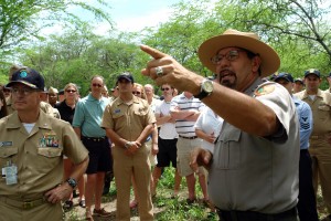 Pearl Harbor (March 16, 2006) - National Park Service Ranger Daniel Martinez addresses a group of Sailors from the Pearl Harbor Surface Navy Association (SNA) at the site of the USS Arizona relics. The Arizona relics are parts of USS Arizona that were removed from the water and placed on shore near Pearl Harbor's West Loch. U.S. Navy photo by Chief Journalist Joe Kane (RELEASED)