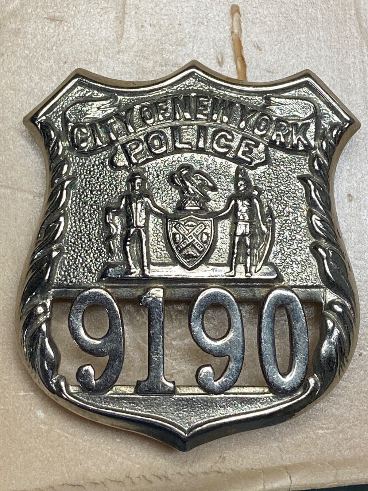Old NYC police badge hallmarked united insignia